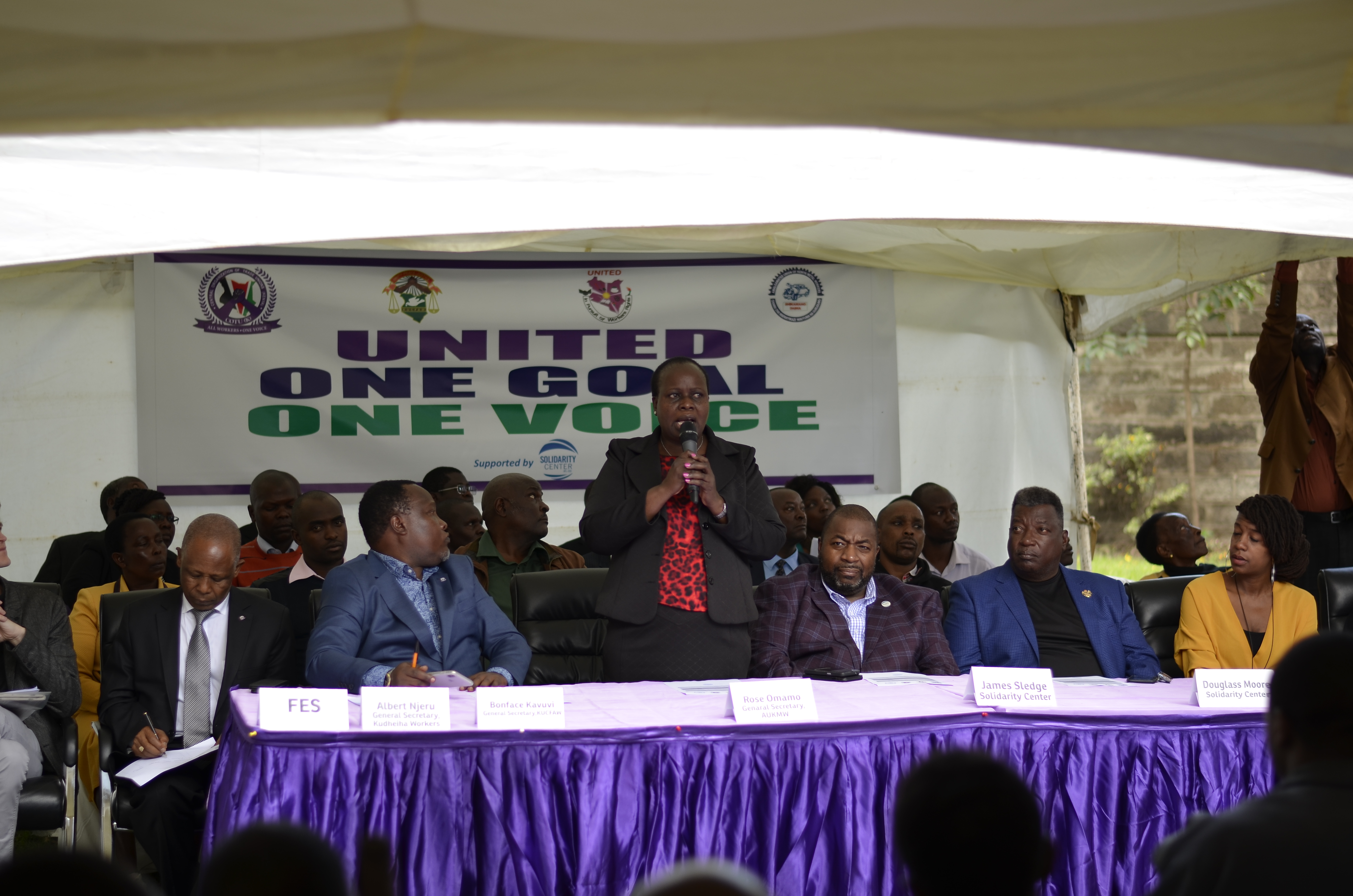 Sis Rose Omamo addressing Informal Workers during the signing of MOU.